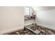 Minimalist gym space with a rowing machine and shelving for storage at 12022 Otto Ln, Carmel, IN 46032