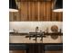 Well-lit kitchen with custom wood cabinets, sleek countertops, and a modern faucet, perfect for cooking and entertaining at 12022 Otto Ln, Carmel, IN 46032