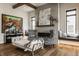 Cozy living room featuring a modern fireplace, comfortable seating, and natural light, perfect for relaxing at 12022 Otto Ln, Carmel, IN 46032