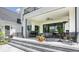 Expansive outdoor patio with a grill, ceiling fan, and multiple seating areas, perfect for gatherings at 12022 Otto Ln, Carmel, IN 46032