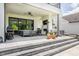 Beautiful outdoor patio with a ceiling fan, grill, and comfortable seating, great for entertaining at 12022 Otto Ln, Carmel, IN 46032