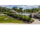Resort-style pool area with lounge chairs, umbrellas, and a pavilion for relaxing by the sparkling pool at 12022 Otto Ln, Carmel, IN 46032