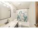 Bathroom with vanity, toilet, and tub with unique ship and octopus shower curtain at 124 Bess Blvd, Pendleton, IN 46064