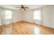 Bedroom with ample natural light from the two windows and a ceiling fan installed at 124 Bess Blvd, Pendleton, IN 46064