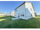 Home's backyard features a patio and exterior view with lawn at 1248 Cassine Pl, Greenwood, IN 46143