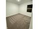 Cozy bedroom featuring soft carpet, natural light from a window, and freshly painted walls at 1248 Cassine Pl, Greenwood, IN 46143