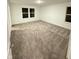 A bright bedroom with wall-to-wall carpet and plenty of natural light at 1248 Cassine Pl, Greenwood, IN 46143