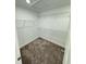 Bright walk-in closet with carpeted floor and white wire shelving at 1248 Cassine Pl, Greenwood, IN 46143