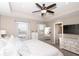 Serene main bedroom boasts a tray ceiling, soft lighting and ample closet space at 12838 Bird Cage, Carmel, IN 46032