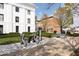 Charming street view features bike racks in front of well-maintained buildings and lush greenery at 12838 Bird Cage, Carmel, IN 46032