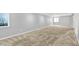 Large carpeted basement with windows, recessed lights, and neutral paint at 14095 Northcoat Pl, Fishers, IN 46038