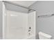 Bathroom with a shower-tub combo and neutral wall paint at 14095 Northcoat Pl, Fishers, IN 46038