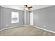 Bedroom features neutral gray walls and carpeted floor at 14095 Northcoat Pl, Fishers, IN 46038