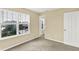 This bright bedroom features a window with neighborhood views, providing a relaxing atmosphere and natural light at 14095 Northcoat Pl, Fishers, IN 46038