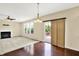 Open floor plan with living room and dining area with sliding door access to outdoor deck at 14095 Northcoat Pl, Fishers, IN 46038