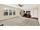 Inviting living space with large windows and easy access to the modern kitchen at 14095 Northcoat Pl, Fishers, IN 46038
