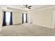 Large main bedroom featuring neutral colors and carpeted floor at 14095 Northcoat Pl, Fishers, IN 46038