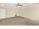 Main bedroom with carpeted floors, ceiling fan, and closet at 14095 Northcoat Pl, Fishers, IN 46038