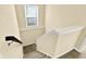 Carpeted staircase with handrail leads to the upper level at 14095 Northcoat Pl, Fishers, IN 46038