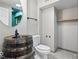 Unique bathroom with a barrel sink and modern fixtures, adding a touch of rustic charm at 143 W Clear Lake Ct, Westfield, IN 46074