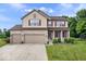 Charming two-story home featuring a three-car garage, brick accents, and well-maintained landscaping at 143 W Clear Lake Ct, Westfield, IN 46074