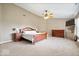 Spacious main bedroom features a tray ceiling, and hard wood furniture at 143 W Clear Lake Ct, Westfield, IN 46074
