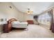 Spacious main bedroom features a tray ceiling, large windows and neutral color palette at 143 W Clear Lake Ct, Westfield, IN 46074