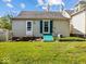 Rear exterior view with back door and backyard access at 146 E Broadway St, Shelbyville, IN 46176