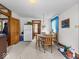 Cozy dining area featuring a wooden table and chairs, with carpeted floors and wood accents at 146 E Broadway St, Shelbyville, IN 46176