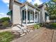 Inviting porch details highlight the entry of this well-maintained home at 146 E Broadway St, Shelbyville, IN 46176