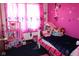 Vibrant bedroom featuring a whimsical theme, a cozy bed, and plenty of space for play at 1504 Gwinn Ln, Lapel, IN 46051