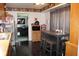 Eat-in kitchen featuring tile floors, stainless refrigerator and an open floorplan at 1504 Gwinn Ln, Lapel, IN 46051