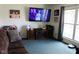 Cozy living room showcases a large window and entertainment center, perfect for relaxing at 1504 Gwinn Ln, Lapel, IN 46051