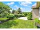 Lush backyard featuring a well-maintained lawn and manicured landscaping, perfect for outdoor enjoyment at 16130 Matlock Cir, Westfield, IN 46074