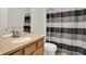 Bathroom featuring vanity, toilet, and shower with striped curtain at 16130 Matlock Cir, Westfield, IN 46074