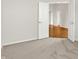 Neutral bedroom featuring a carpet and open doors to another room at 16130 Matlock Cir, Westfield, IN 46074