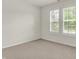 Neutral bedroom featuring a carpet and two windows at 16130 Matlock Cir, Westfield, IN 46074