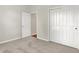Bedroom featuring carpet and sliding door closet at 16130 Matlock Cir, Westfield, IN 46074