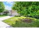 Charming brick home featuring a well-maintained lawn and a large shade tree in a desirable location at 16130 Matlock Cir, Westfield, IN 46074