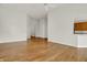 Open-concept living space with hardwood floors flowing into the kitchen area at 16130 Matlock Cir, Westfield, IN 46074