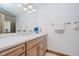 Bright bathroom featuring quartz countertops, modern fixtures, and ample cabinet space for storage at 18 Point Ln, Arcadia, IN 46030