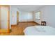 Cozy bedroom with hardwood floors and natural light from the windows, offers a comfortable retreat at 18 Point Ln, Arcadia, IN 46030