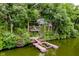 Lakeside home featuring a private dock and access to the water at 18 Point Ln, Arcadia, IN 46030