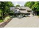 Spacious home with large deck perfect for entertaining and enjoying the well-maintained backyard and lush landscape at 18 Point Ln, Arcadia, IN 46030