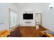 Living room featuring modern furnishings, a flat-screen TV, and abundant natural light at 18 Point Ln, Arcadia, IN 46030