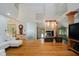 Bright living room with hardwood floors and views of the greenery at 18 Point Ln, Arcadia, IN 46030