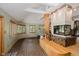 Cozy living room with a fireplace and large windows providing natural light at 18 Point Ln, Arcadia, IN 46030