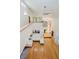 Lofted living room with hardwood floors and modern decor, offering an open and airy space for living and entertaining at 18 Point Ln, Arcadia, IN 46030