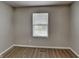 This room features neutral walls, carpet flooring, and a window at 19533 Chip Shot Rd, Noblesville, IN 46062