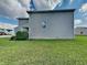 Side exterior of home features a green lawn at 19533 Chip Shot Rd, Noblesville, IN 46062